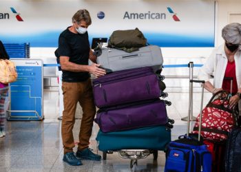 American Airlines raises bag fee by $10 for luggage checked at the airport