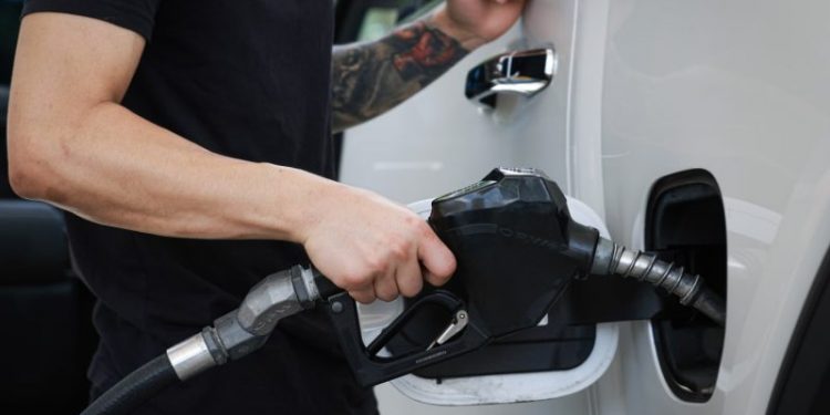 Oil prices hit three-month lows, head for weekly loss as summer driving season kicks off