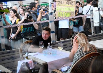 Barcelona protesters throw items and spray travelers with water while shouting ‘tourists go home’