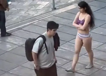 Iranian woman strips down in anti-hijab protest following vicious assault by regime militia