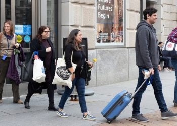 ‘Fired me illegally’: Emotional ex-USAID employees leave building with belongings after mass layoffs