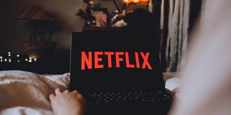 Why is Netflix considering going all-cash for WBD assets?