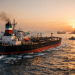 US lets Iranian oil tankers pass Hormuz as conflict sends crude soaring