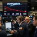 Top stocks dragging the Dow Jones Index as it moves into a correction
